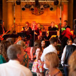 Live swing and soul band The Get Downs performing at a wedding reception at Pinewood Studios, Buckinghamshire